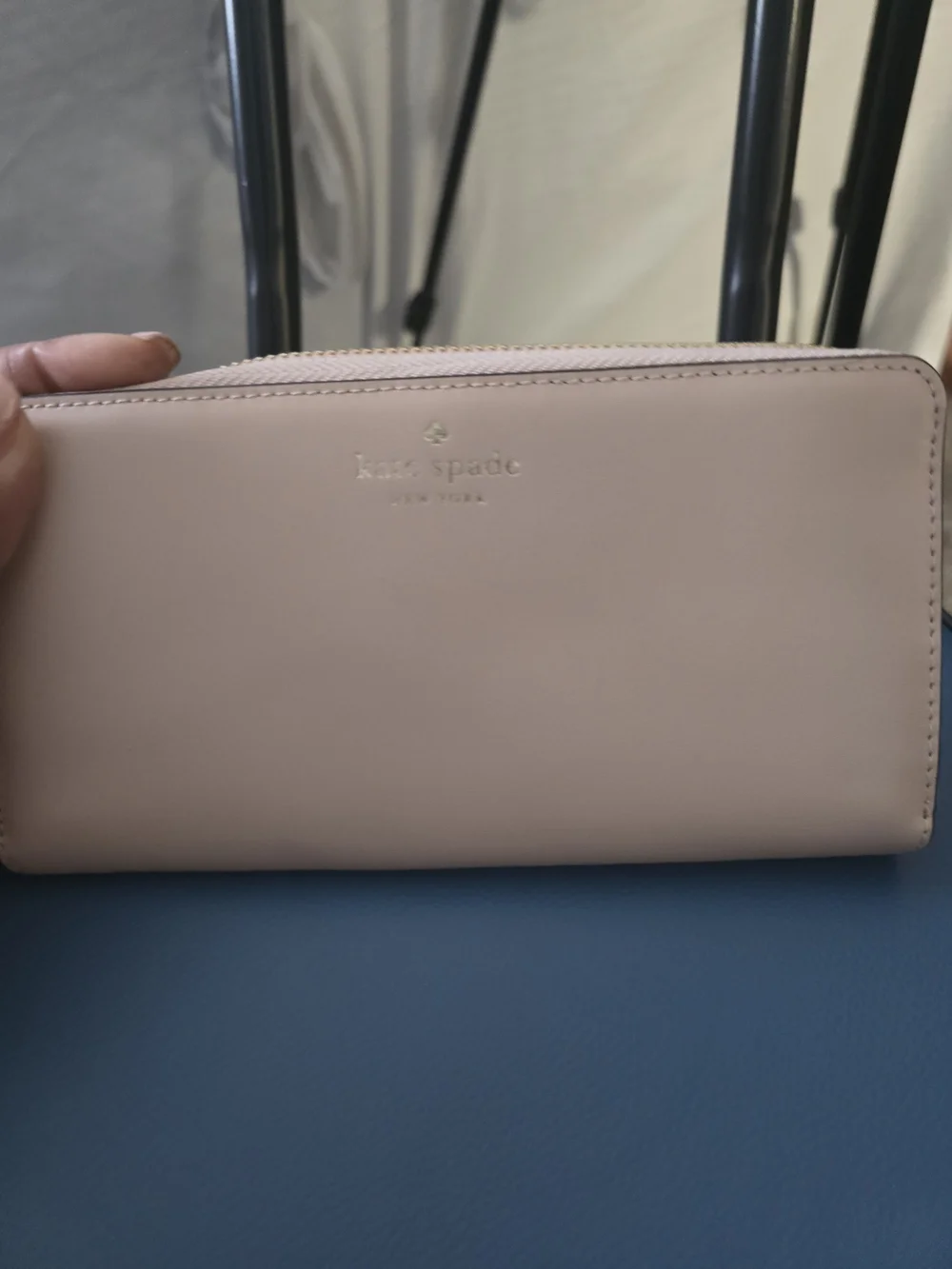 kate spade pale pink zip-around leather wallet